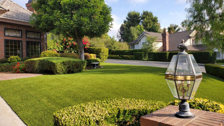 Artificial grass lawn replacement installed in a Milwaukee area backyard.